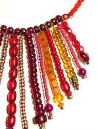 Halskæde m røde, rosa og orange glasperler UNIKA - eget design